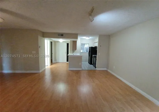 Photo 3 of Condo for sale at 2871 N Oakland Forest Dr #210, Oakland Park, FL 33309 | MLS# A12074571 | Listing updated on 2026-09-24