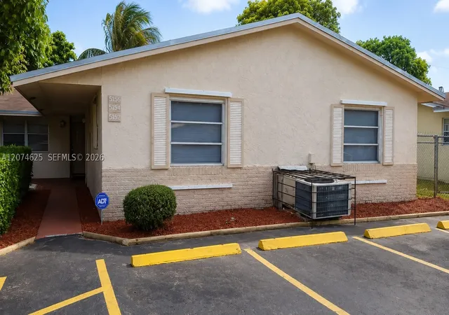 Multi family home for sale at 5880 Nw 19Th Ct, Lauderhill, FL 33313 | MLS# A12074625