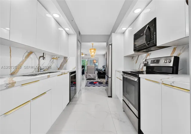Listing Photo 1 - Condo for sale in building located at 1651 Sw 127Th Ave, Pembroke Pines, FL 33027 - Unit #212A