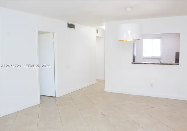 Listing Photo 1 - Condo for sale at Village Of Kings Creek, Unit L-406 7860 Camino Real, Village Of Kings Creek, Miami, FL 33143 | Built Year: 1972-1973