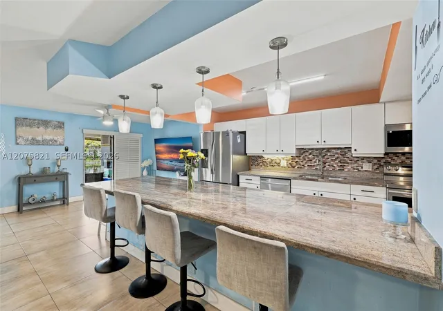 Photo 3 of Townhouse for sale at 958 Mockingbird Ln #513, Plantation, FL 33324 | MLS# A12075821 | Listing updated on 2026-09-06
