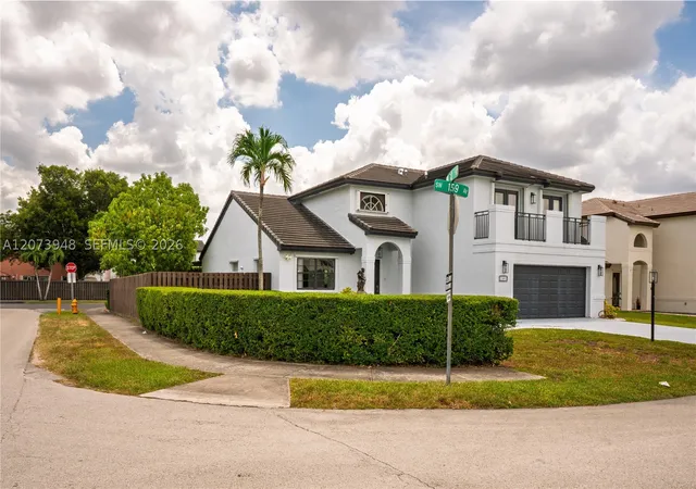 Listing Photo 1 - Condo for sale at Heftler Homes At Lago Mar, Unit 7301 Sw 159Th Ave, Heftler Homes At Lago Mar, Miami, FL 33193 | Built Year: 1992-1998