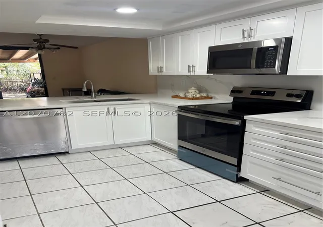 Photo 3 of Townhouse for sale at 12242 Sw 16Th Ter #102-L, Miami, FL 33175 | MLS# A12070782 | Listing updated on 2026-08-29