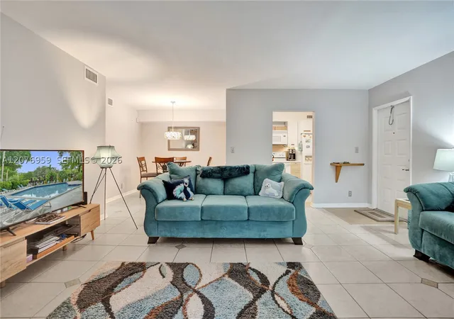 Listing Photo 1 - Condo for sale in building located at 3017 N Oakland Forest Dr, Oakland Park, FL 33309 - Unit #208