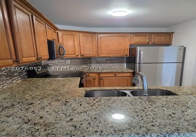 Photo 4 of Condo for sale at 6955 Nw 186Th St #F306, Hialeah, FL 33015 | MLS# A12076857 | Listing updated on 2026-08-27