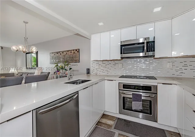 Listing Photo 1 - Condo for sale in Monte Carlo of Miami located at 492 Nw 165Th St Rd, Miami, FL 33169 - Unit #C112