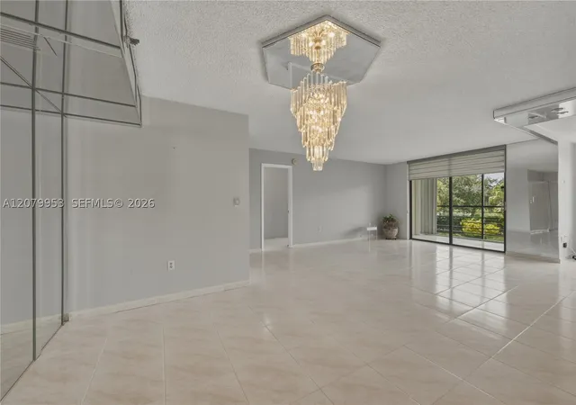 Photo 1 of Condo for sale at 900 Saint Charles Pl #310, Pembroke Pines, FL 33026 | MLS# A12079953 | Listing updated on 2026-08-31