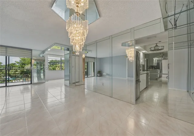 Photo 4 of Condo for sale at 900 Saint Charles Pl #310, Pembroke Pines, FL 33026 | MLS# A12079953 | Listing updated on 2026-08-31