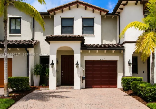 Photo 1 of Townhouse for sale at 10327 Nw 89th Terrace, Doral, FL 33178 | MLS# A12080217 | Listing updated on 2026-09-11