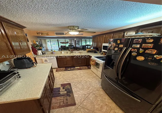 Photo 4 of Condo for sale at 5613 Coral Lake Dr #201, Margate, FL 33063 | MLS# A12080267 | Listing updated on 2026-09-10