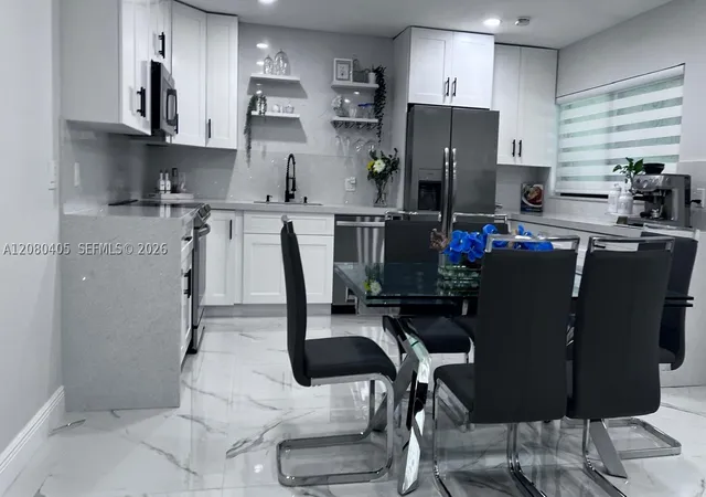 Photo 3 of Townhouse for sale at 1531 NW 98th Avenue, Pembroke Pines, FL 33024 | MLS# A12080405 | Listing updated on 2026-09-02