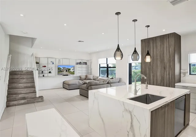 Photo 4 of Single family home for sale at 606 NE 191st Terrace, Miami, FL 33179 | MLS# A12080289 | Listing updated on 2026-09-01