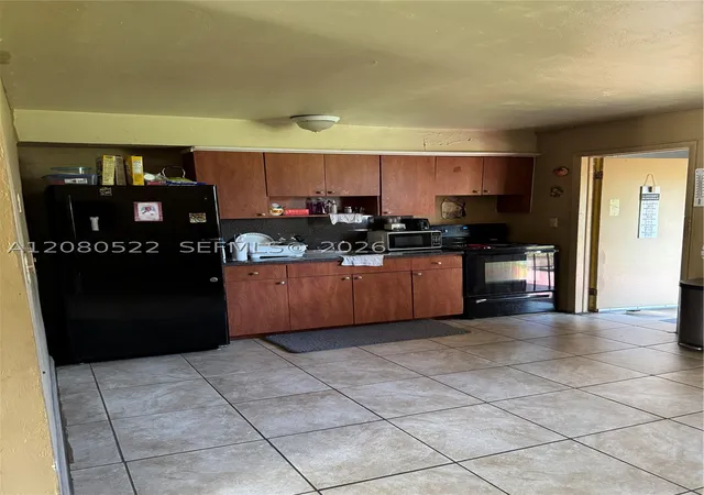 Photo 3 of House for sale at 1075 NW 100th Street, Miami, FL 33150 | MLS# A12080522 | Listing updated on 2026-08-31
