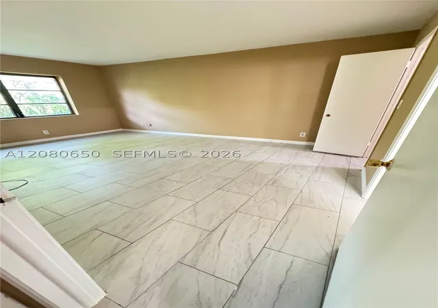 Photo 3 of Condo for sale at 3129 Oakland Shrs Dr #A109, Oakland Park, FL 33309 | MLS# A12080650 | Listing updated on 2026-09-11