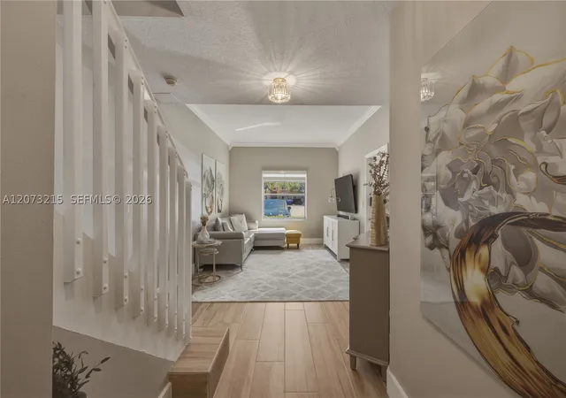 Photo 3 of Townhouse for sale at 4965 W White Mangrove Way #102-1, Dania Beach, FL 33312 | MLS# A12073215 | Listing updated on 2026-09-01