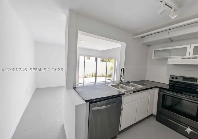 Photo 3 of Townhouse for sale at 1311 SW 124th Court #17-E, Miami, FL 33184 | MLS# A12080746 | Listing updated on 2026-09-10