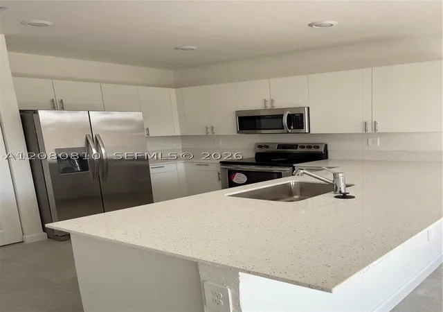 Photo 3 of Townhouse for sale at 11872 SW 247th Terrace, Homestead, FL 33032 | MLS# A12080810 | Listing updated on 2026-09-10
