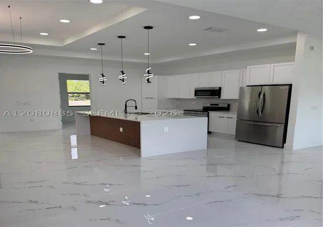 Photo 3 of Single family home for sale at 842 Nina Ave, Lehigh Acres, FL 33974 | MLS# A12080885 | Listing updated on 2026-09-01