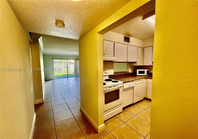 Photo 2 of Condo for sale at 5201 Geneva Way #109, Doral, FL 33166 | MLS# A12080917 | Listing updated on 2026-09-09