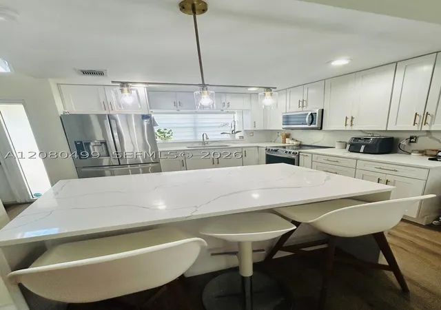 Photo 2 of Single family home for sale at 7342 Nw 38th Place, Coral Springs, FL 33065 | MLS# A12080499 | Listing updated on 2026-08-31