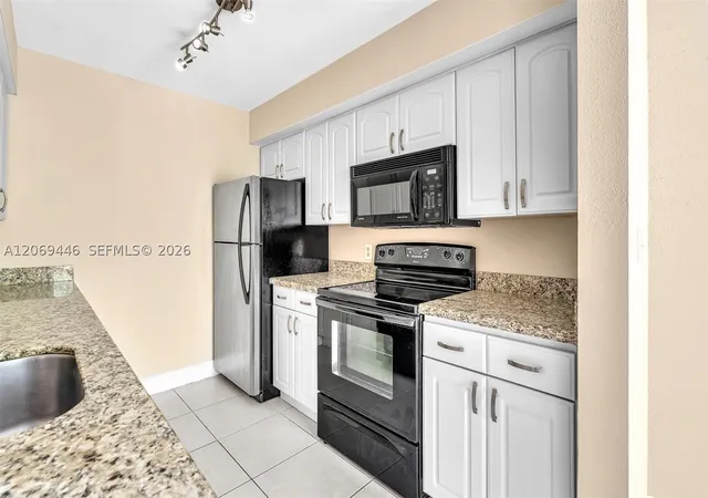 Photo 3 of Condo for sale at 2667 Nw 33rd Street #2413, Oakland Park, FL 33309 | MLS# A12069446 | Listing updated on 2026-09-01