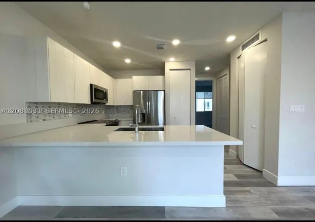 Listing Photo 5 - Condo for sale in building located at 10229 Nw 64Th Ter, Doral, FL 33178 - Unit #303