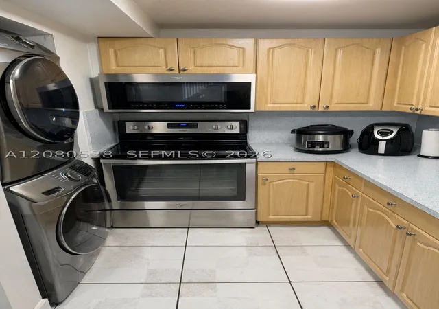 Photo 4 of Condo for sale at 10090 NW 80th Court #1540, Hialeah Gardens, FL 33016 | MLS# A12080538 | Listing updated on 2026-09-11