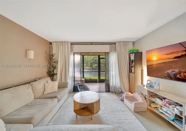 Listing Photo 1 - Condo for sale in building located at 1706 Hammock Blvd, Coconut Creek, FL 33063 - Unit #110