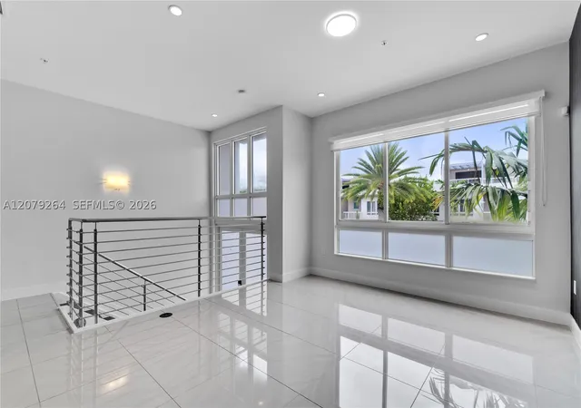 Photo 2 of Townhouse for sale at 10517 Nw 66th Street, Doral, FL 33178 | MLS# A12079264 | Listing updated on 2026-09-01