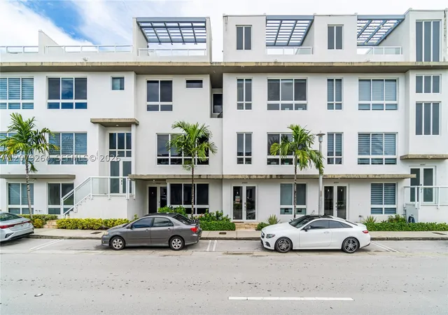 Photo 3 of Townhouse for sale at 10517 NW 66th Street, Doral, FL 33178 | MLS# A12079264 | Listing updated on 2026-09-01