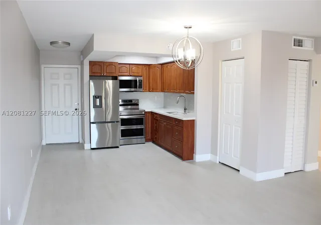 Photo 2 of Condo for sale at 6780 W 2nd Court #401, Hialeah, FL 33012 | MLS# A12081227 | Listing updated on 2026-09-01
