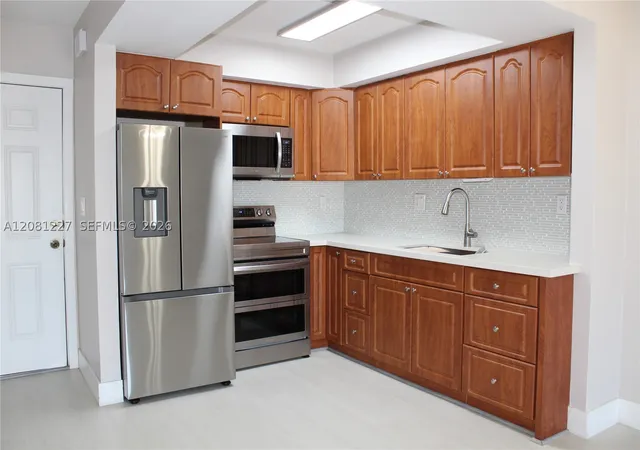 Photo 3 of Condo for sale at 6780 W 2nd Court #401, Hialeah, FL 33012 | MLS# A12081227 | Listing updated on 2026-09-01