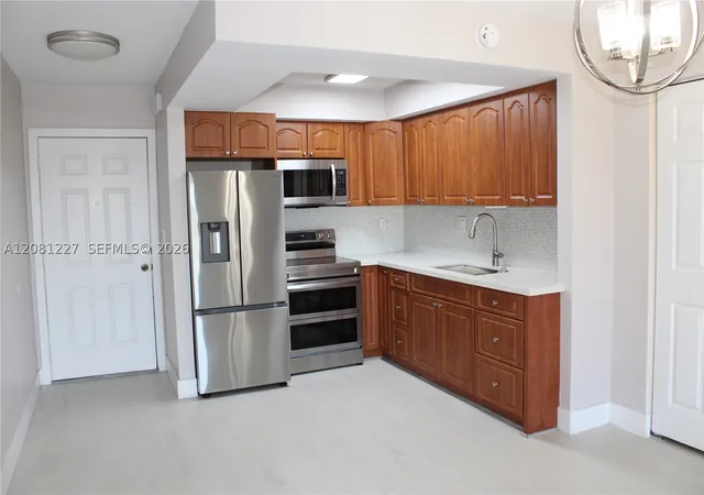 Photo 3 of Condo for sale at 6780 W 2nd Court #401, Hialeah, FL 33012 | MLS# A12081227 | Listing updated on 2026-09-01