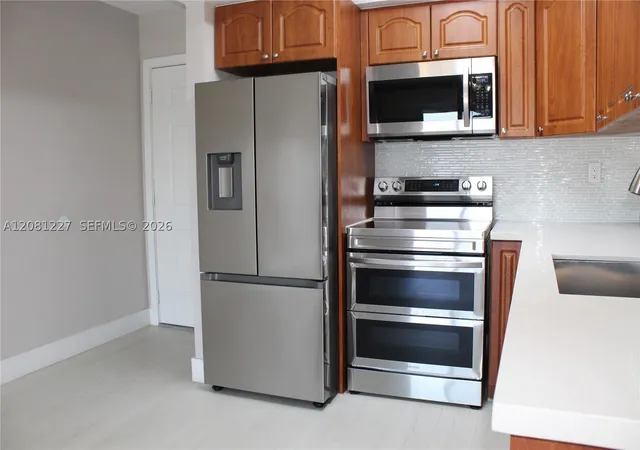 Photo 4 of Condo for sale at 6780 W 2nd Court #401, Hialeah, FL 33012 | MLS# A12081227 | Listing updated on 2026-09-01