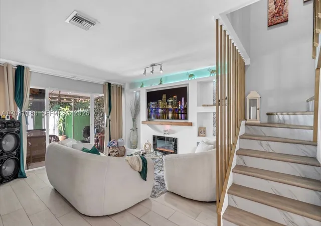 Photo 1 of Townhouse for sale at 789 Crystal Lake Dr, Deerfield Beach, FL 33064 | MLS# A12081180 | Listing updated on 2026-09-12