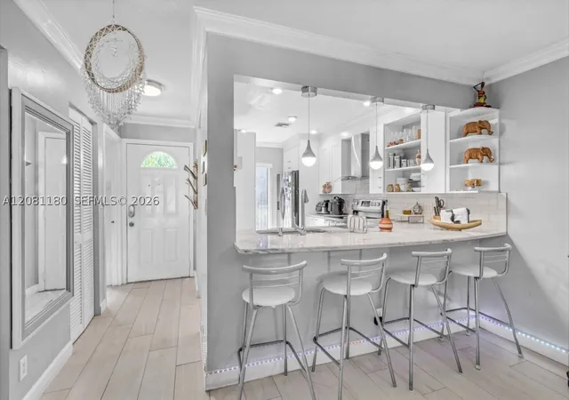 Photo 4 of Townhouse for sale at 789 Crystal Lake Dr, Deerfield Beach, FL 33064 | MLS# A12081180 | Listing updated on 2026-09-12
