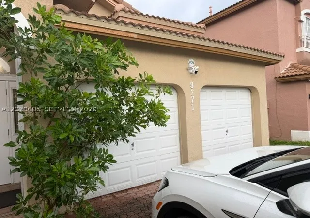 Photo 3 of Single family home for sale at 9771 NW 32nd Street, Doral, FL 33172 | MLS# A12079085 | Listing updated on 2026-09-14