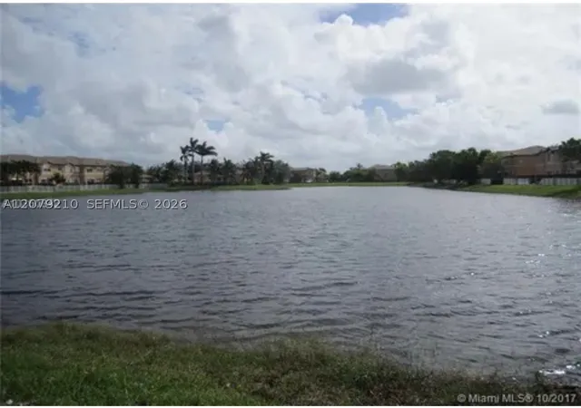 Photo 3 of Townhouse for sale at 11520 Nw 79th Lane, Doral, FL 33178 | MLS# A12079210 | Listing updated on 2026-09-16