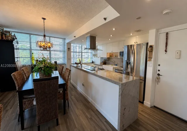 Photo 3 of Condo for sale at 1200 Saint Charles Pl #411, Pembroke Pines, FL 33026 | MLS# A12080883 | Listing updated on 2026-09-02
