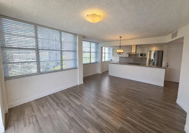 Photo 3 of Condo for sale at 1200 Saint Charles Pl #411, Pembroke Pines, FL 33026 | MLS# A12080883 | Listing updated on 2026-09-02