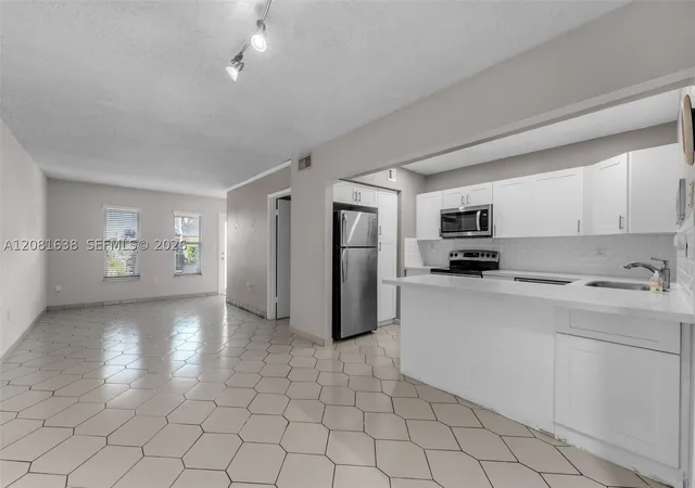 Photo 3 of Townhouse for sale at 2018 SW 103rd Court, Miami, FL 33165 | MLS# A12081638 | Listing updated on 2026-09-10