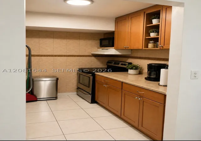 Photo 2 of Condo for sale at 11855 Ne 19th Drive #49, North Miami, FL 33181 | MLS# A12081644 | Listing updated on 2026-09-18