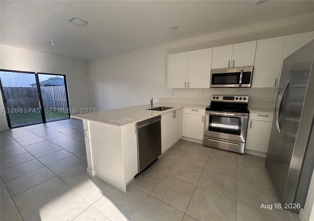 Photo 3 of Townhouse for sale at 28567 SW 134th Avenue, Homestead, FL 33033 | MLS# A12081745 | Listing updated on 2026-09-02