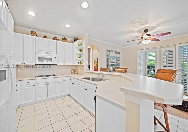 Photo 4 of Townhouse for sale at 1634 Passion Vine Cir #31-2, Weston, FL 33326 | MLS# A12081763 | Listing updated on 2026-09-02