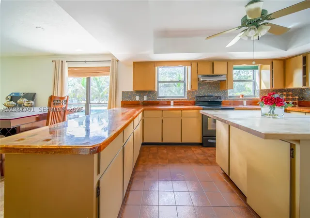 Photo 3 of Single family home for sale at 576 Marshall Rd, West Palm Beach, FL 33413 | MLS# A12081791 | Listing updated on 2026-09-17