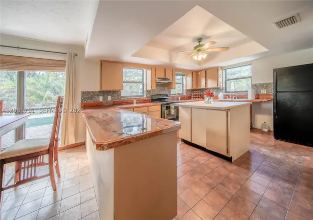 Photo 4 of Single family home for sale at 576 Marshall Rd, West Palm Beach, FL 33413 | MLS# A12081791 | Listing updated on 2026-09-17