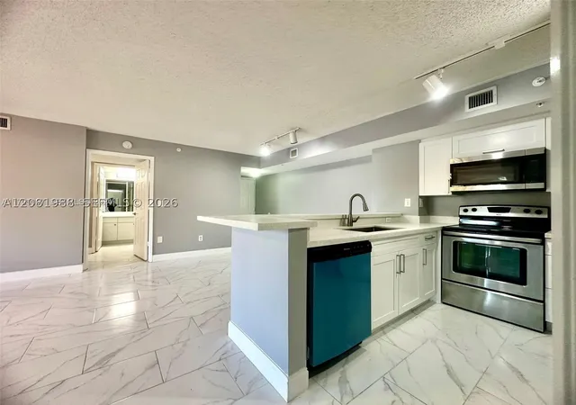 Photo 3 of Condo for sale at 2620 S University Dr #105, Davie, FL 33328 | MLS# A12081988 | Listing updated on 2026-09-13