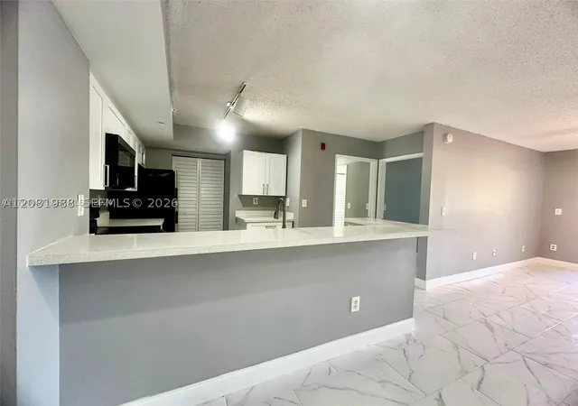 Photo 4 of Condo for sale at 2620 S University Dr #105, Davie, FL 33328 | MLS# A12081988 | Listing updated on 2026-09-13