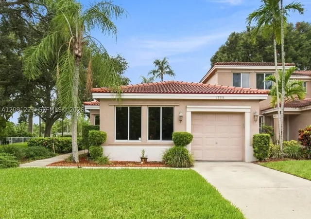 Photo 1 of Townhouse for sale at 1533 W Harmony Lake Cir, Davie, FL 33324 | MLS# A12081221 | Listing updated on 2026-09-02