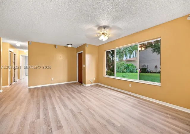 Photo 3 of Townhouse for sale at 1533 W Harmony Lake Cir, Davie, FL 33324 | MLS# A12081221 | Listing updated on 2026-09-02